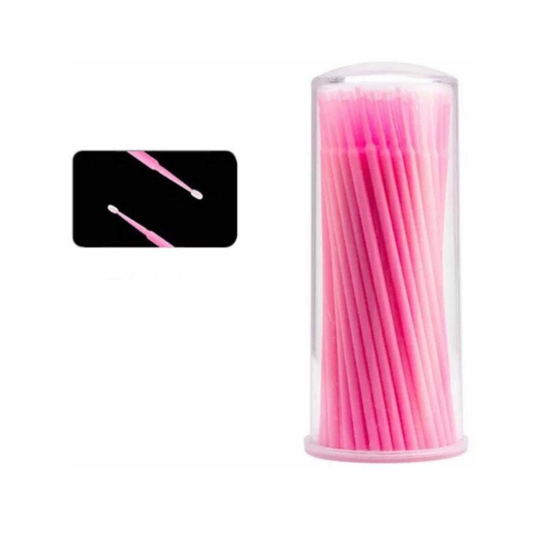 MicroBrush rosados en un tubo transparente, con un recuadro de sus puntas.